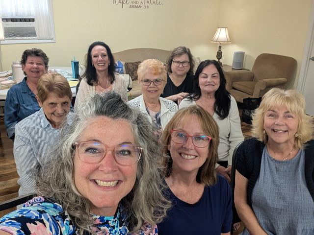 LifeWorks women smiling together beneath the words of Jeremiah 29:11