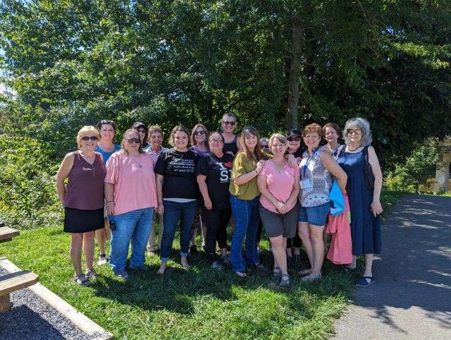 The women of LifeWorks gathered outdoors in the sunshine